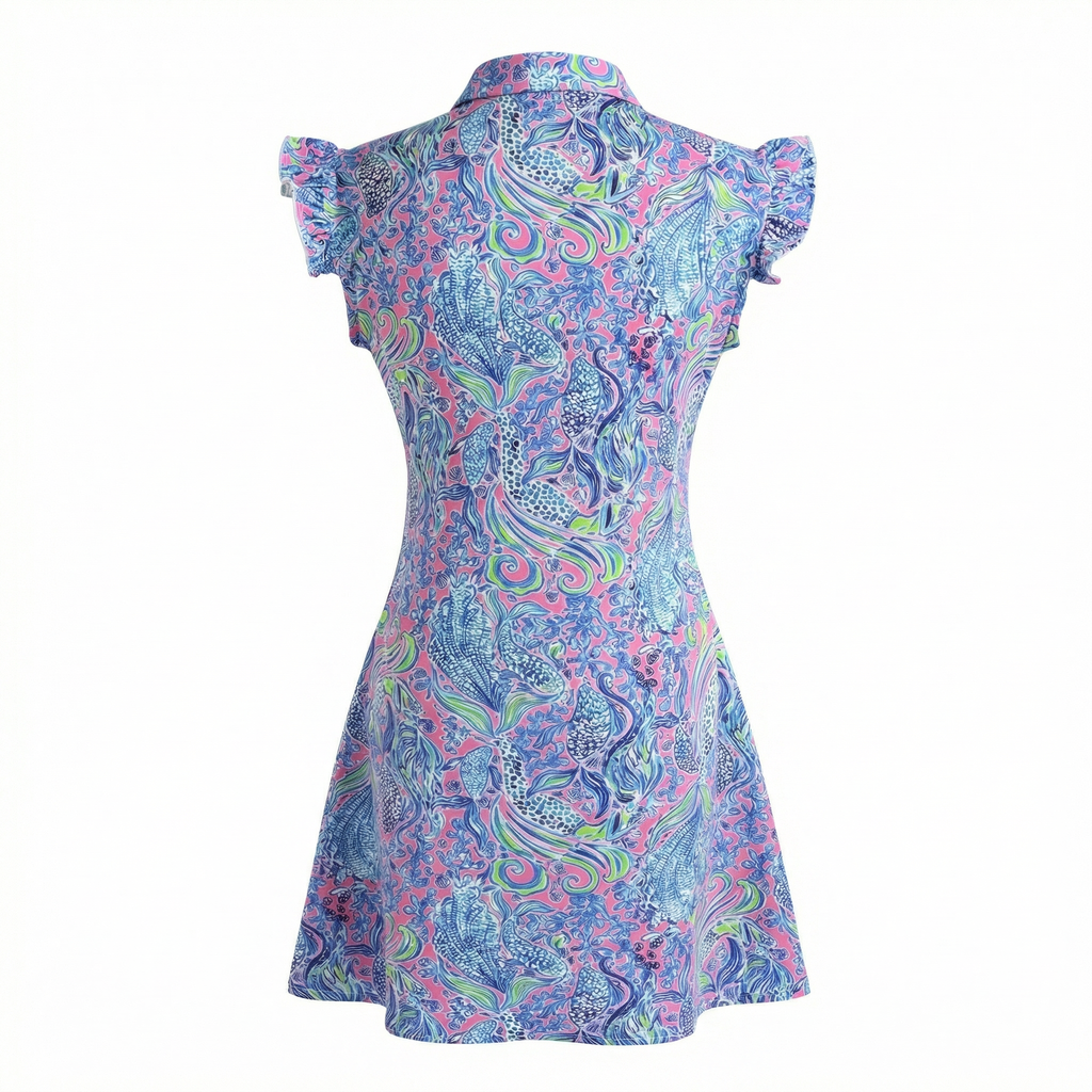 Colorful patterned Birdies & Bubbles golf dress on a white background