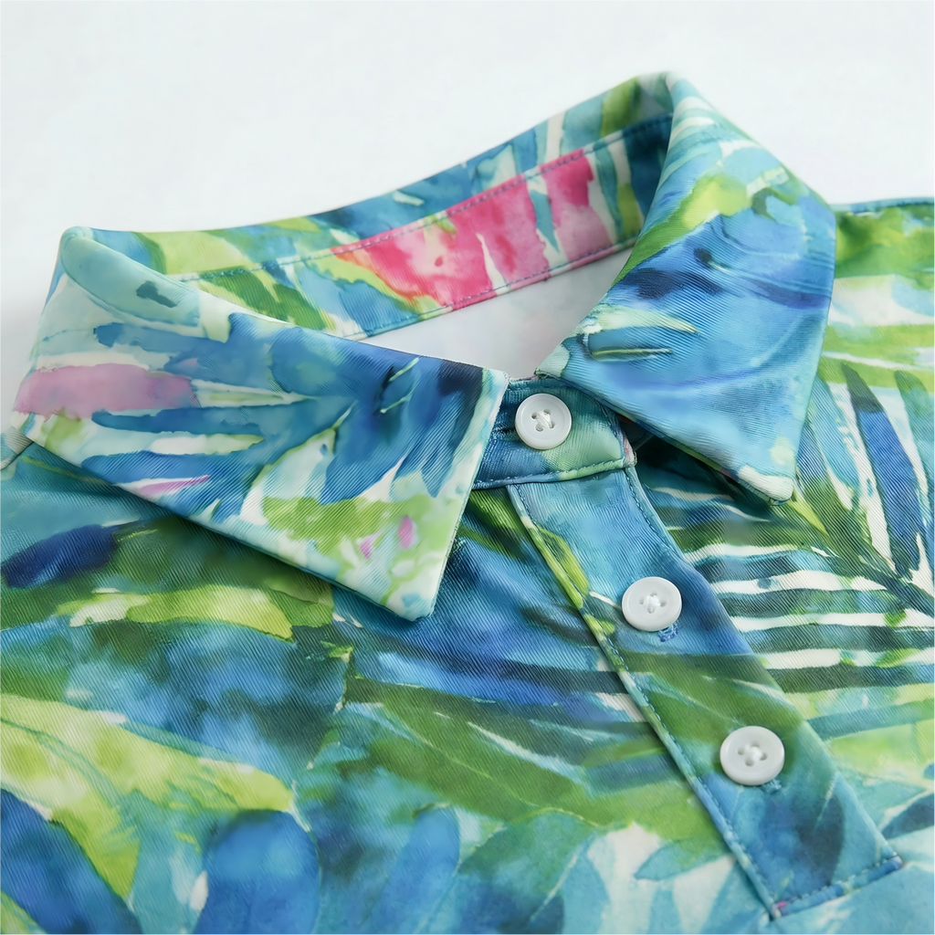 Colorful tropical leaf patterned shirt with buttons on a white background